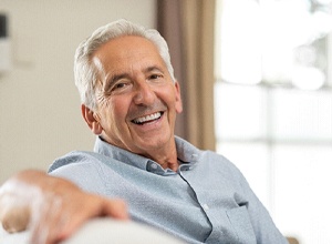 Relaxed, smiling senior man with All-on-4 in Newington