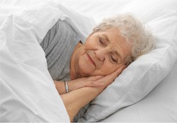 Senior woman sleeping soundly