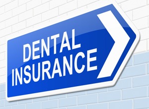Large blue dental insurance sign