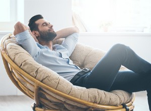 Man resting comfortably in chair