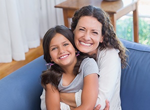 Parent and young daughter