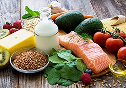 Variety of healthy, nutrient-rich foods arranged on tabletop