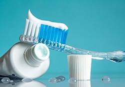 Close-up of toothbrush and toothpaste, essential oral hygiene tools