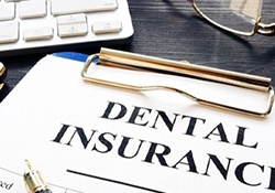 insurance paperwork for the cost of dental implants in Newington