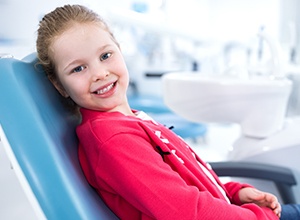 Little girl receiving dental exam