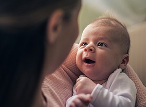 Mother holding her baby