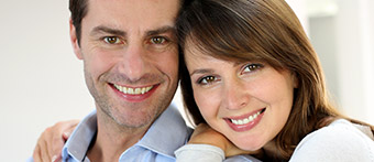 Man and woman smiling together