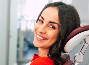 Woman smiling in dental chair